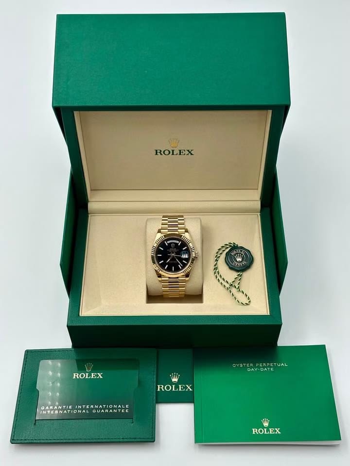 Rolex | Day-Date | 228238 | Yellow gold | 40 mm | Yellow gold | Black | Automatic