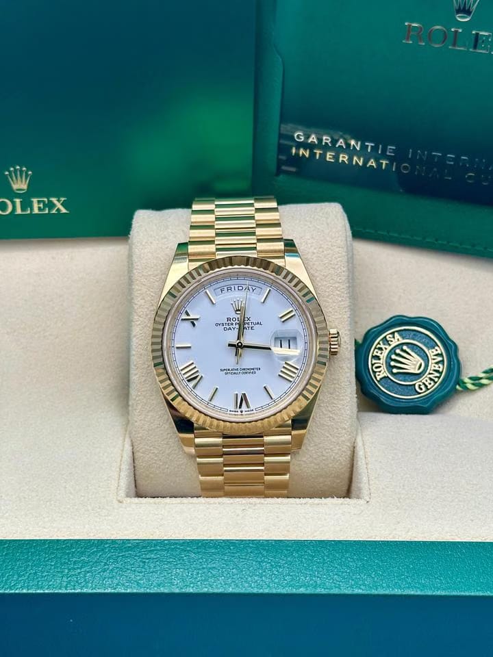Rolex | Day-Date | 228238 | Yellow gold | 40 mm | Yellow gold | Silver (solid) | Automatic