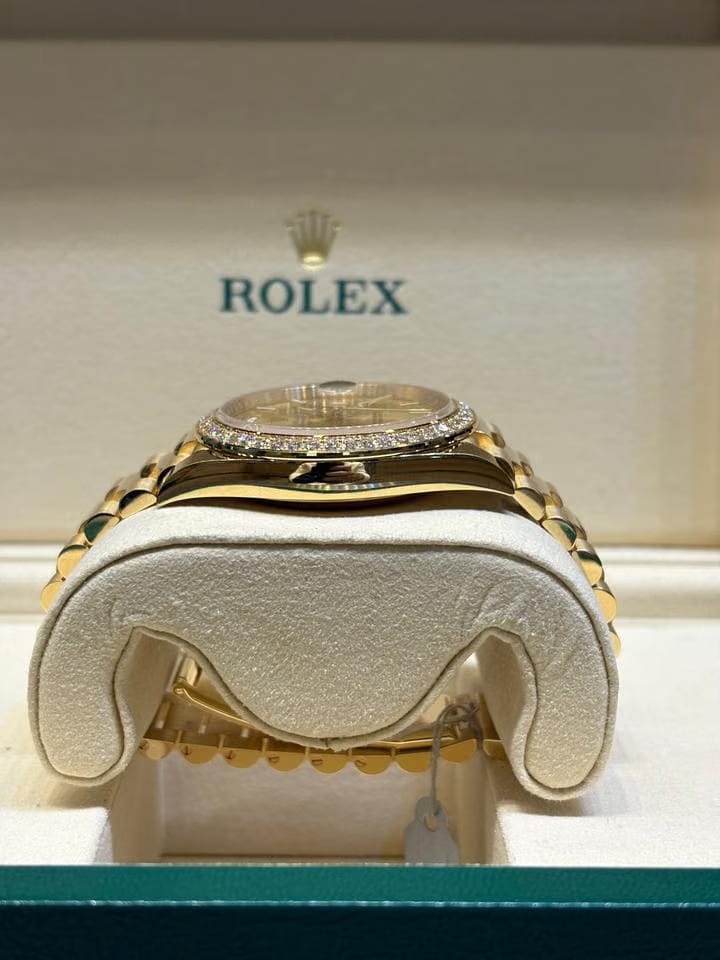 Rolex | Day-Date | 228348RBR | Yellow gold | 40 x 48 mm | Yellow gold | Champagne | Automatic