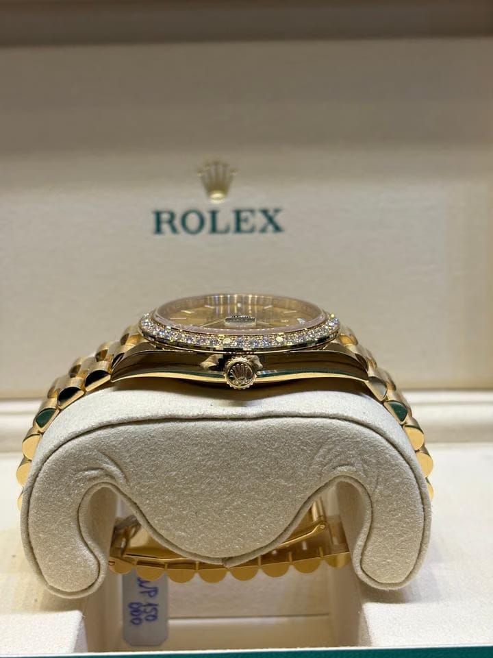 Rolex | Day-Date | 228348RBR | Yellow gold | 40 x 48 mm | Yellow gold | Champagne | Automatic