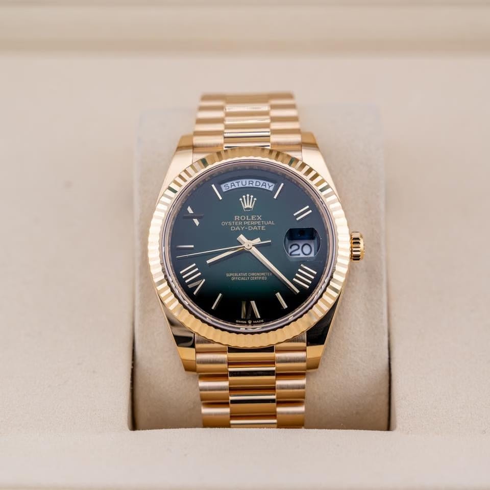 Rolex | Day-Date | 228238 | Yellow gold | 40 mm | Yellow gold | Green | Automatic