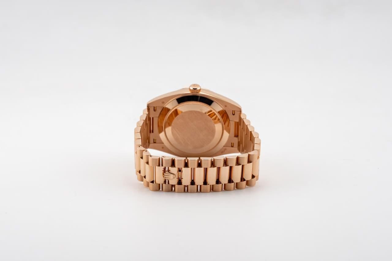 Rolex | Day-Date | 228235 | Rose gold | 40 mm | Rose gold | Black | Automatic
