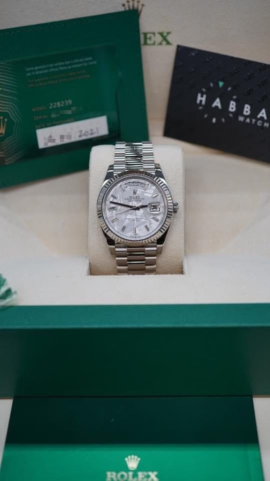 Rolex | Day-Date | 228239 | Yellow gold | 40 mm | White gold | Silver | Automatic