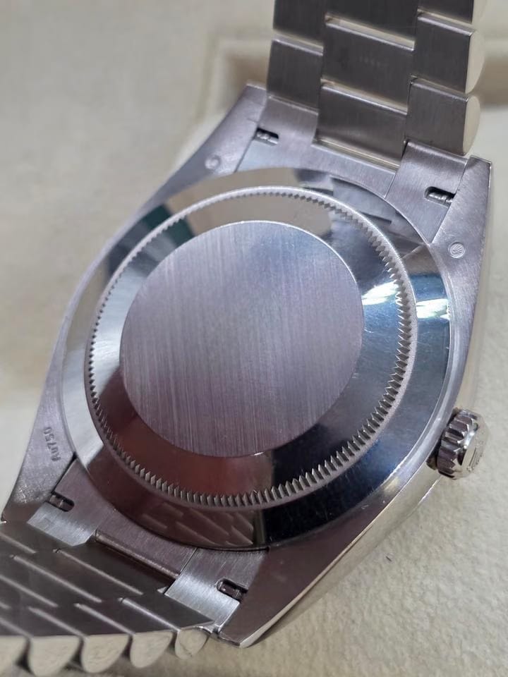 Rolex | Day-Date | 228239 | Yellow gold | 40 mm | White gold | Silver | Automatic