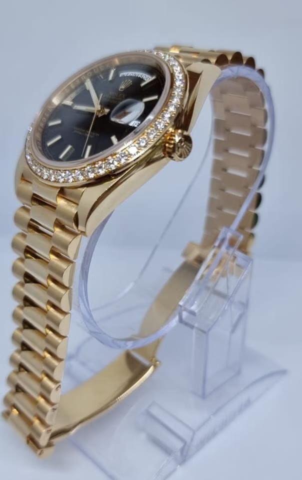 Rolex | Day-Date | 228348 | Yellow gold | 40 mm | Yellow gold | Black | Automatic