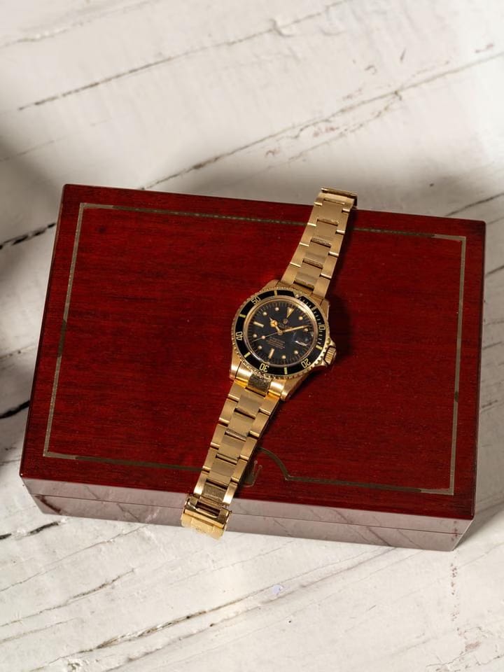 Rolex | Submariner | 1680 | Yellow gold | 40 mm | Steel | Black | Automatic