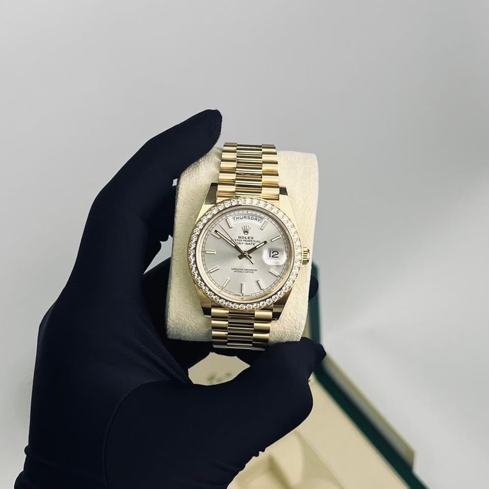 Rolex | Day-Date | 228348RBR | Yellow gold | 40 x 48 mm | Yellow gold | White | Automatic