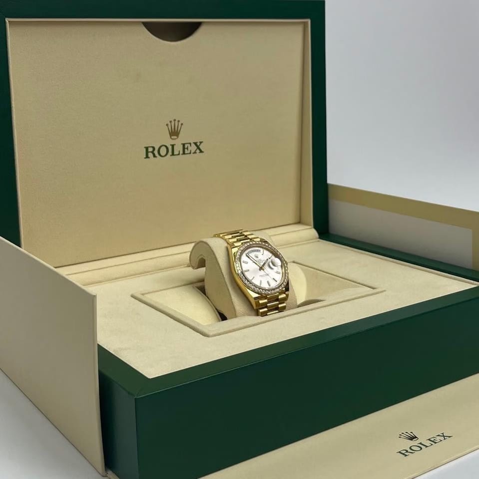 Rolex | Day-Date | 228348RBR | Yellow gold | 40 x 48 mm | Yellow gold | White | Automatic