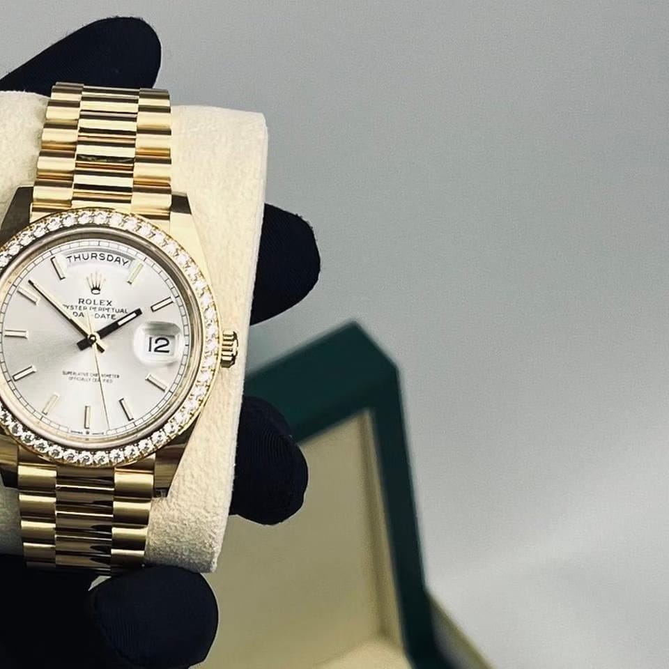 Rolex | Day-Date | 228348RBR | Yellow gold | 40 x 48 mm | Yellow gold | White | Automatic