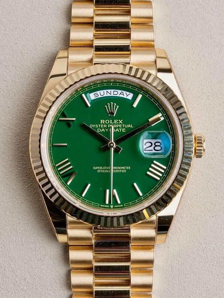 Rolex | Day-Date | 228238-0069 | Yellow gold | 40 mm | Yellow gold | Green | Automatic