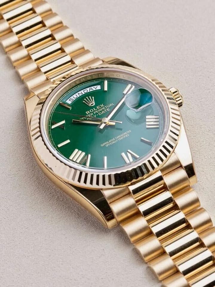 Rolex | Day-Date | 228238-0069 | Yellow gold | 40 mm | Yellow gold | Green | Automatic