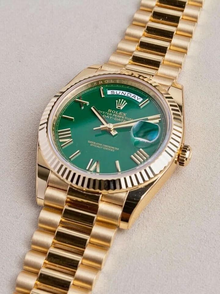Rolex | Day-Date | 228238-0069 | Yellow gold | 40 mm | Yellow gold | Green | Automatic