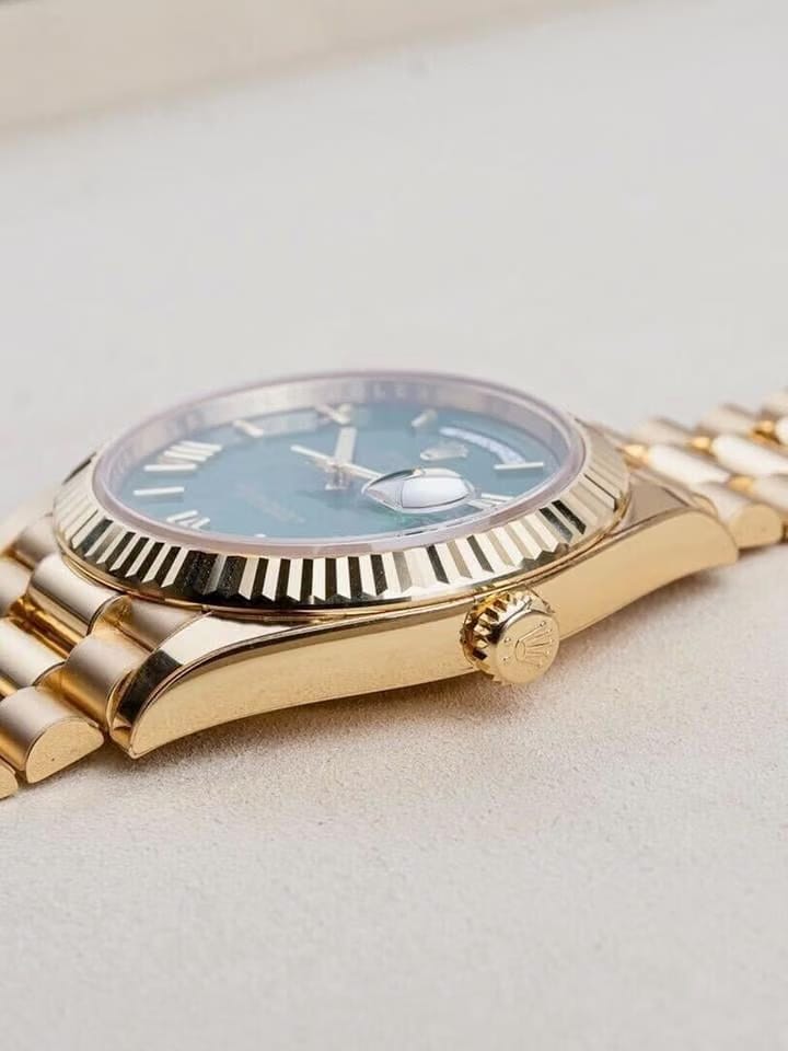 Rolex | Day-Date | 228238-0069 | Yellow gold | 40 mm | Yellow gold | Green | Automatic