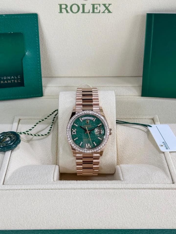 Rolex | Day-Date | 128345RBR | Rose gold | 36 x 43 mm | Rose gold | Green | Automatic
