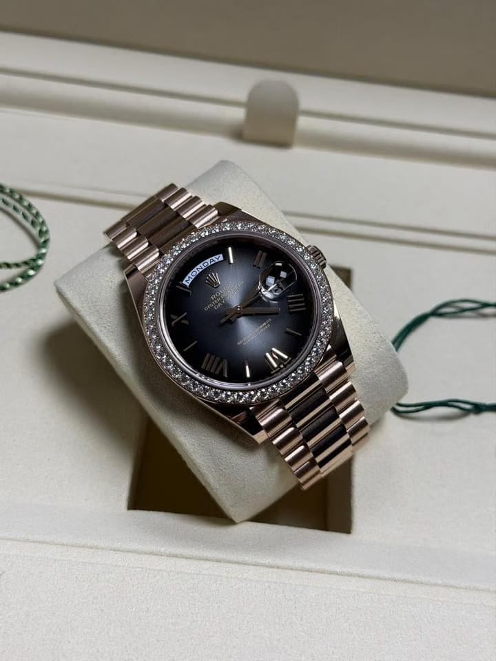 Rolex | Day-Date | 228345RBR | Rose gold | 40 x 48 mm | Rose gold | Black | Automatic