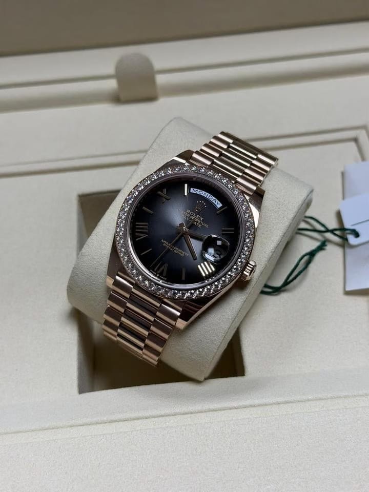Rolex | Day-Date | 228345RBR | Rose gold | 40 x 48 mm | Rose gold | Black | Automatic