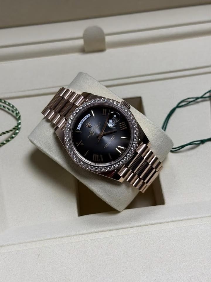 Rolex | Day-Date | 228345RBR | Rose gold | 40 x 48 mm | Rose gold | Black | Automatic
