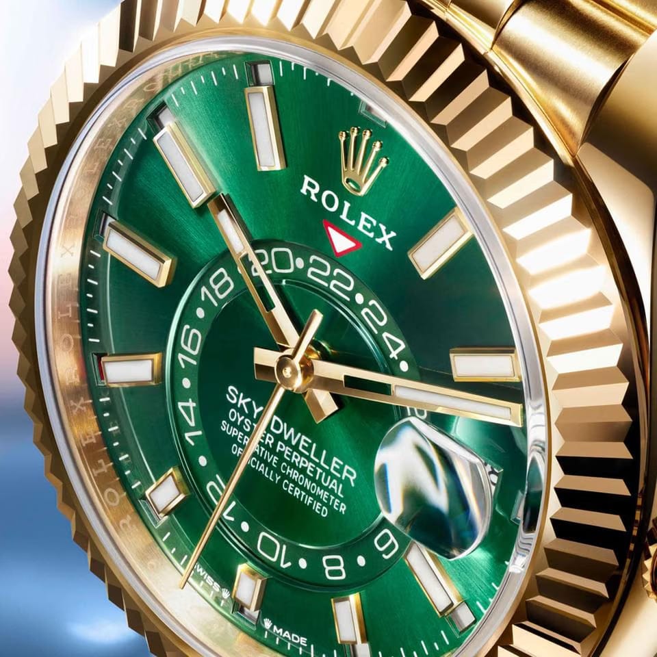 Rolex | Sky-Dweller | 336938-0008 | Yellow gold | 42 mm | Yellow gold | Green | Automatic