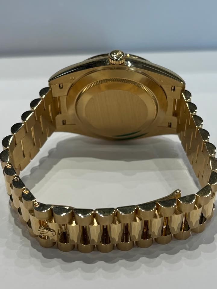 Rolex | Day-Date | 228348RBR | Yellow gold | 40 mm | Yellow gold | Black | Automatic