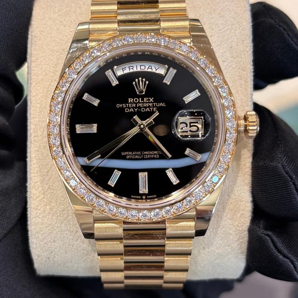 Rolex | Day-Date | 228348RBR | Yellow gold | 40 mm | Yellow gold | Black | Automatic