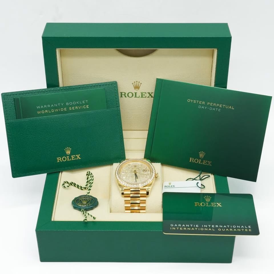 Rolex | Day-Date | 228348RBR | Yellow gold | 40 x 48 mm | Yellow gold | Yellow | Automatic