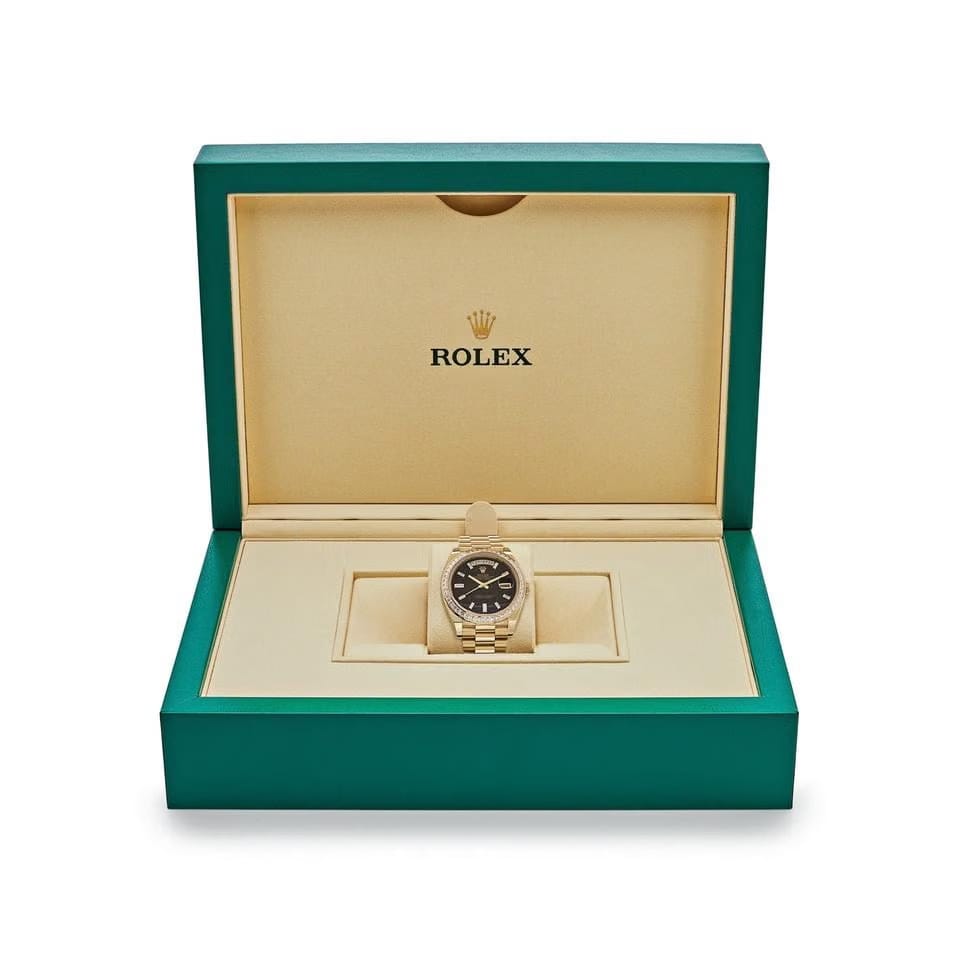 Rolex | Day-Date | 228398TBR | Yellow gold | 40 mm | Yellow gold | Black | Automatic