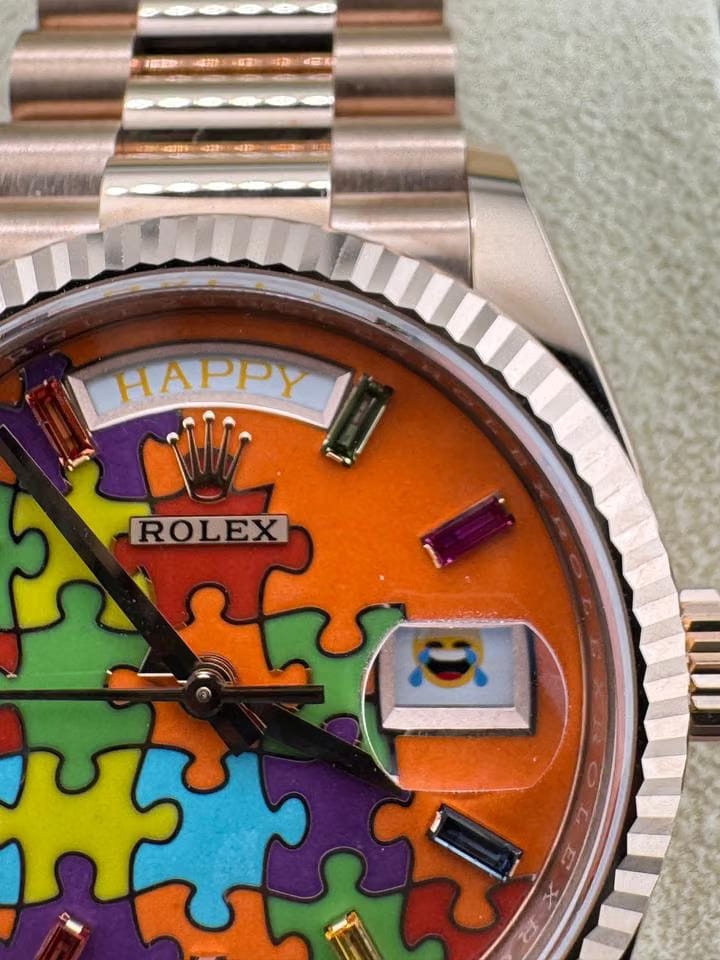 Rolex | Day-Date | 128235 | Rose gold | 36 x 43 mm | Rose gold | Orange | Automatic