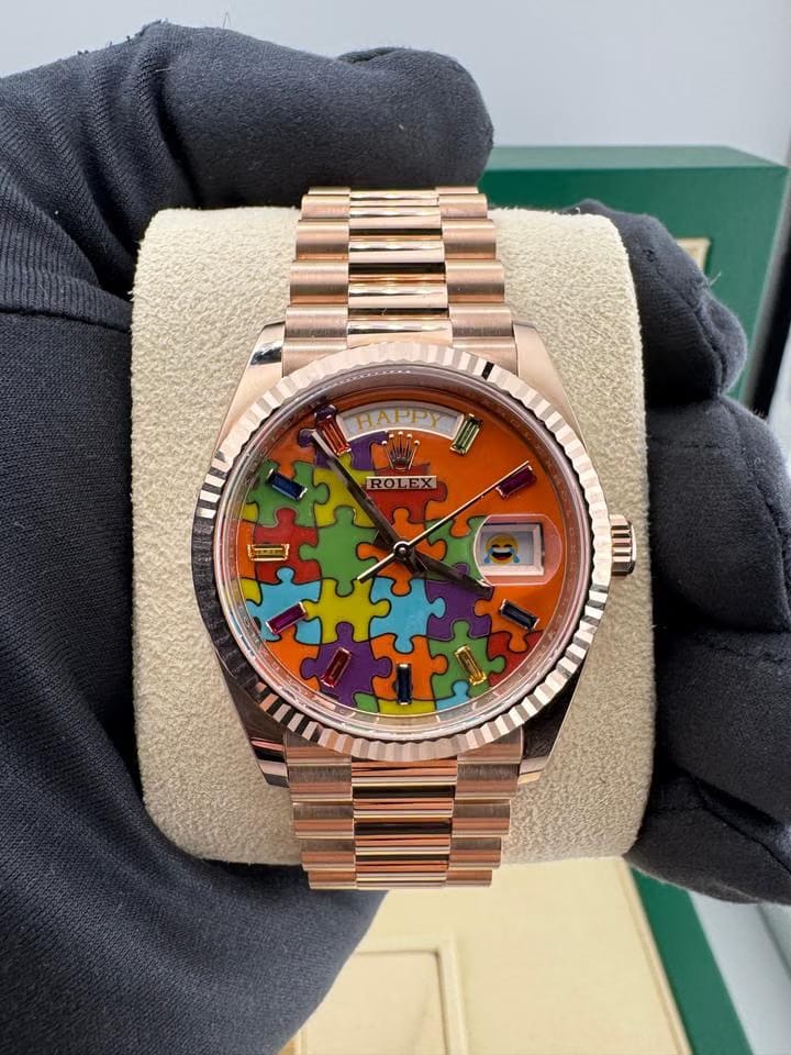 Rolex | Day-Date | 128235 | Rose gold | 36 x 43 mm | Rose gold | Orange | Automatic