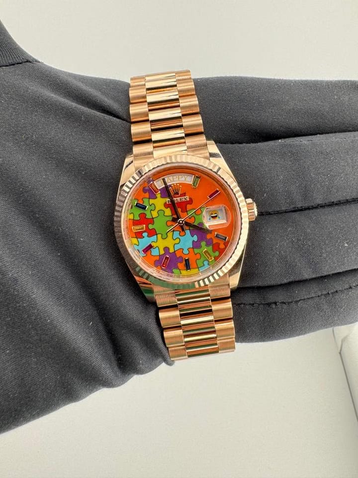 Rolex | Day-Date | 128235 | Rose gold | 36 x 43 mm | Rose gold | Orange | Automatic