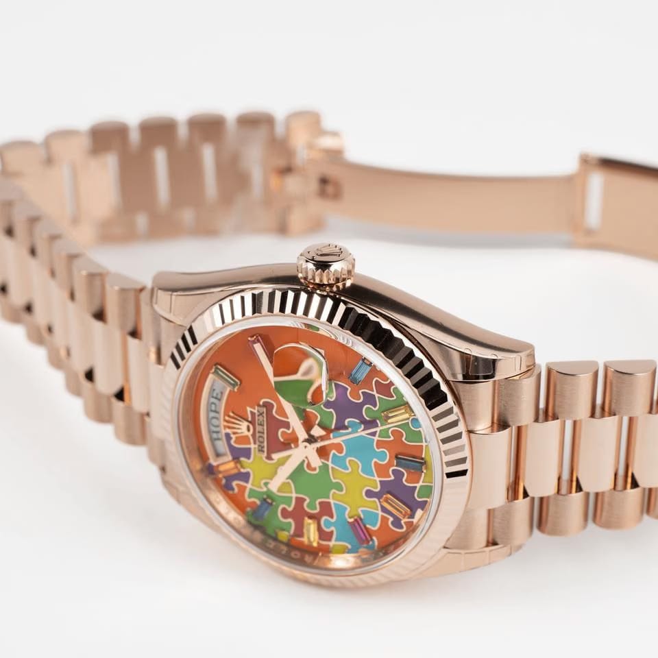 Rolex | Day-Date | 128235 | Rose gold | 36 mm | Rose gold | Orange | Automatic