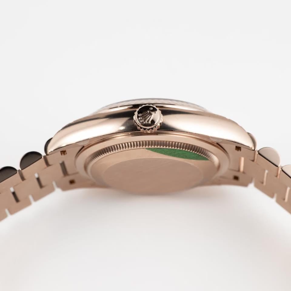 Rolex | Day-Date | 128235 | Rose gold | 36 mm | Rose gold | Orange | Automatic