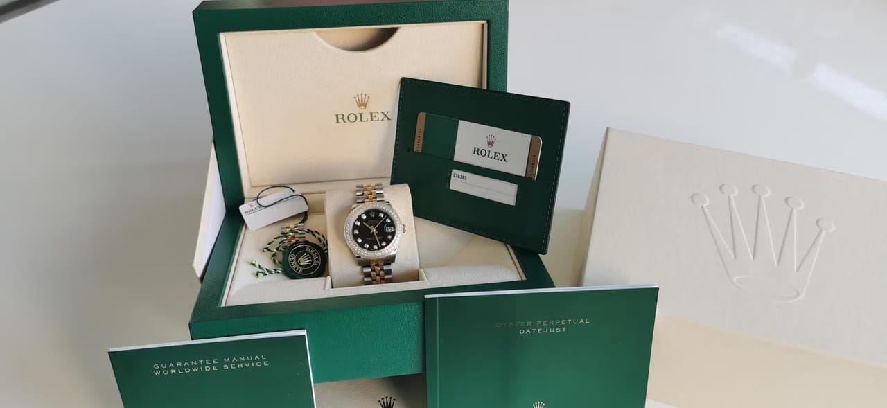 Rolex Oyster Perpetual 31 Cadran noir pierres précieuses Port et expertise offerts