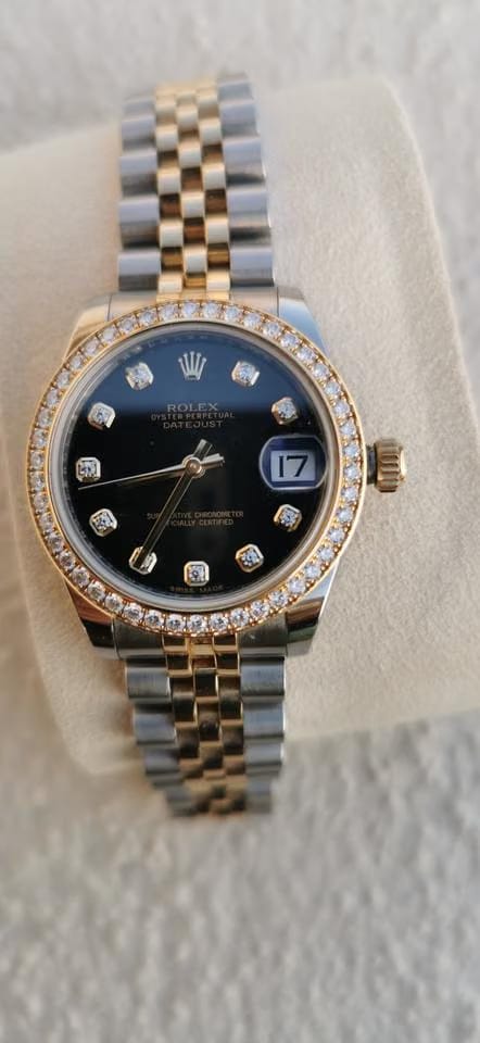 Rolex Oyster Perpetual 31 Cadran noir pierres précieuses Port et expertise offerts