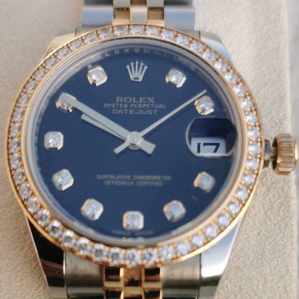 Rolex Oyster Perpetual 31 Cadran noir pierres précieuses Port et expertise offerts