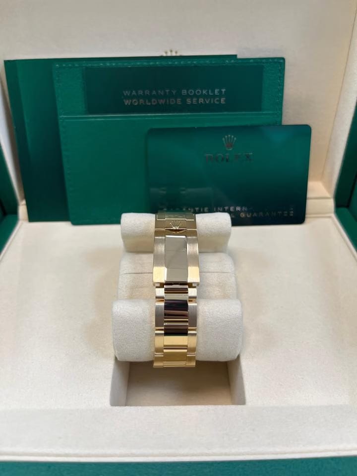 Rolex Yellow Gold Black And Champagne Index Dial Oyster Bracelet 126508