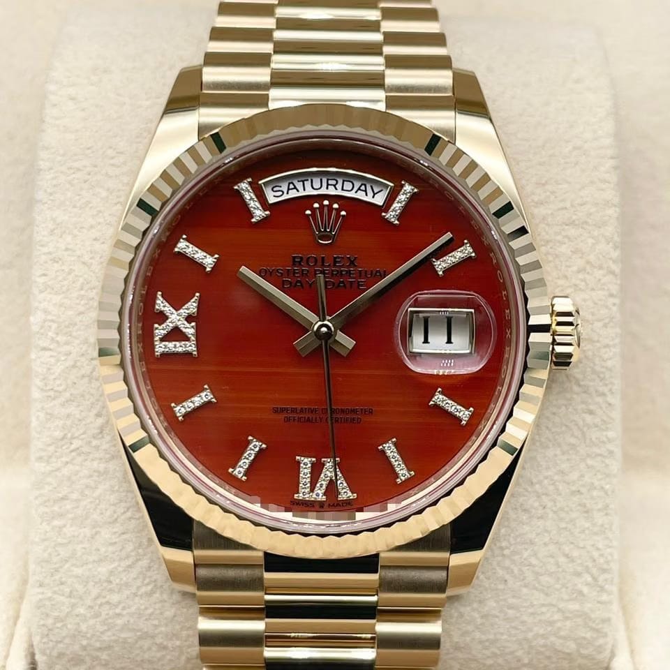 Rolex | Day-Date | 128238 | Yellow gold | 36 x 43 mm | Yellow gold | Orange | Automatic
