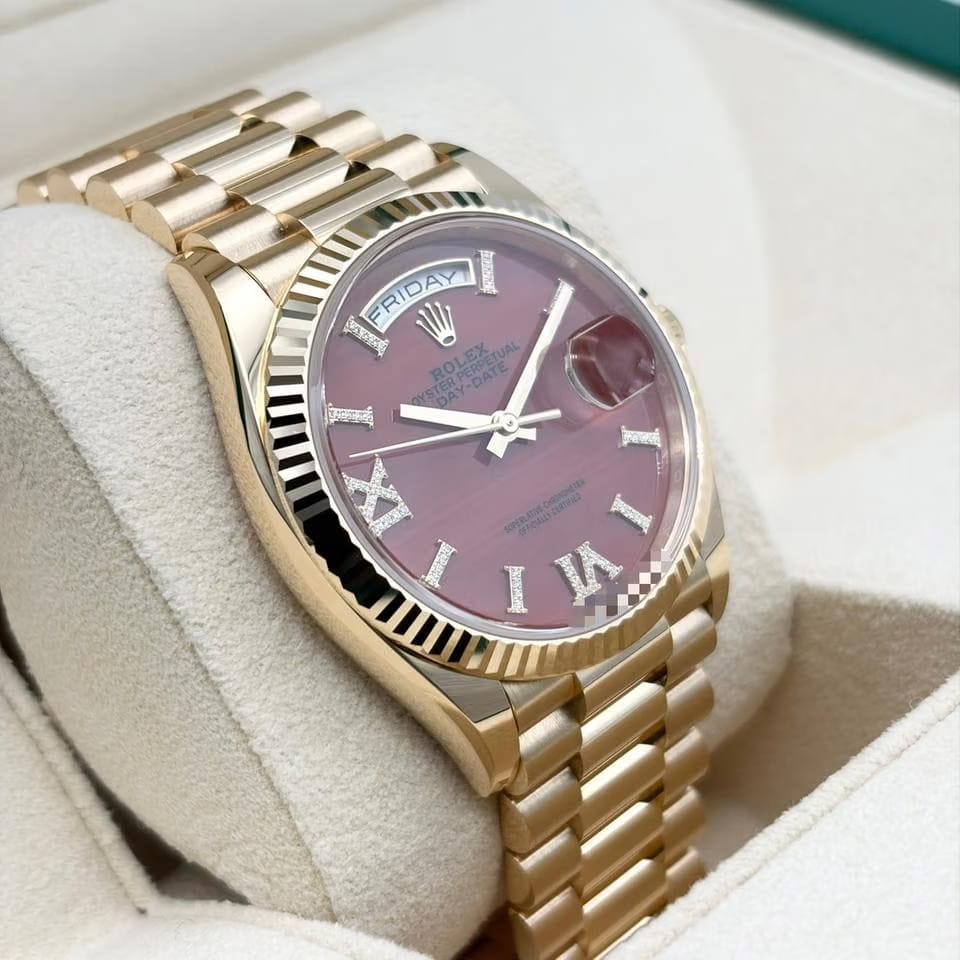 Rolex | Day-Date | 128238 | Yellow gold | 36 x 43 mm | Yellow gold | Orange | Automatic