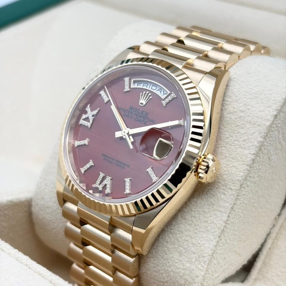 Rolex | Day-Date | 128238 | Yellow gold | 36 x 43 mm | Yellow gold | Orange | Automatic