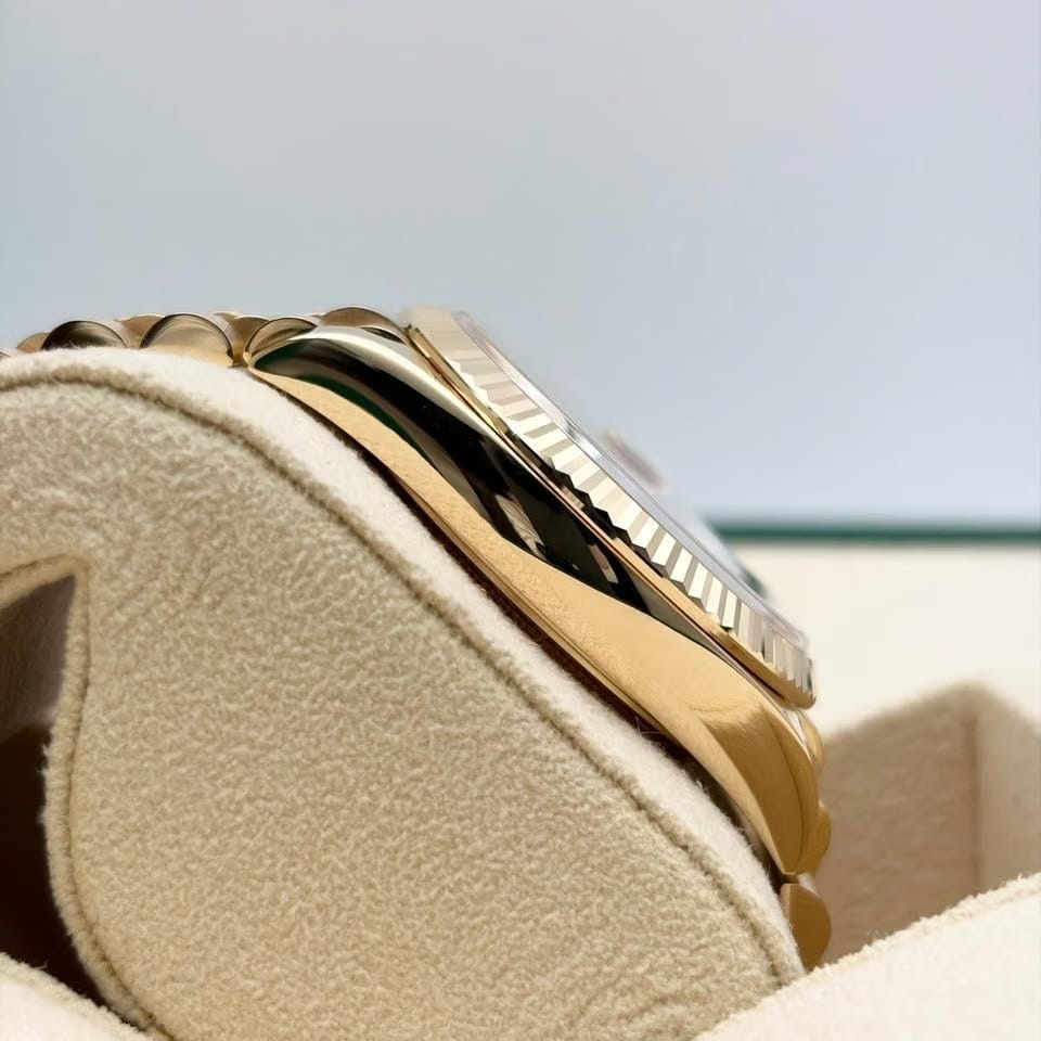 Rolex | Day-Date | 128238 | Yellow gold | 36 x 43 mm | Yellow gold | Orange | Automatic