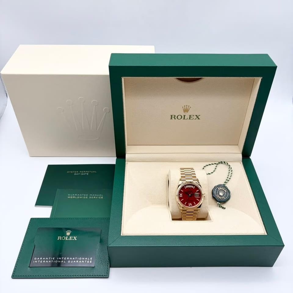 Rolex | Day-Date | 128238 | Yellow gold | 36 x 43 mm | Yellow gold | Orange | Automatic
