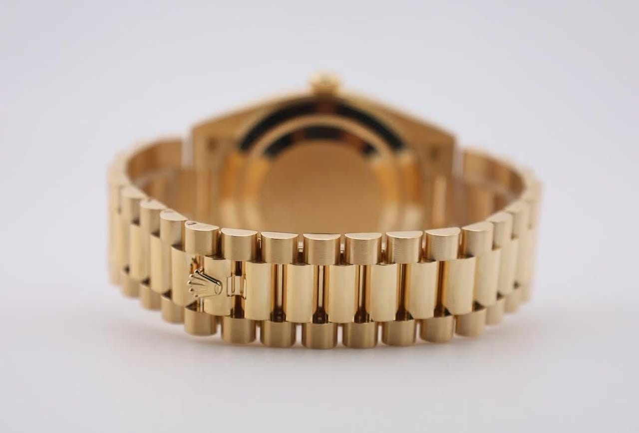 Rolex | Day-Date | 228238-0006 | Yellow gold | 40 mm | Yellow gold | Champagne | Automatic