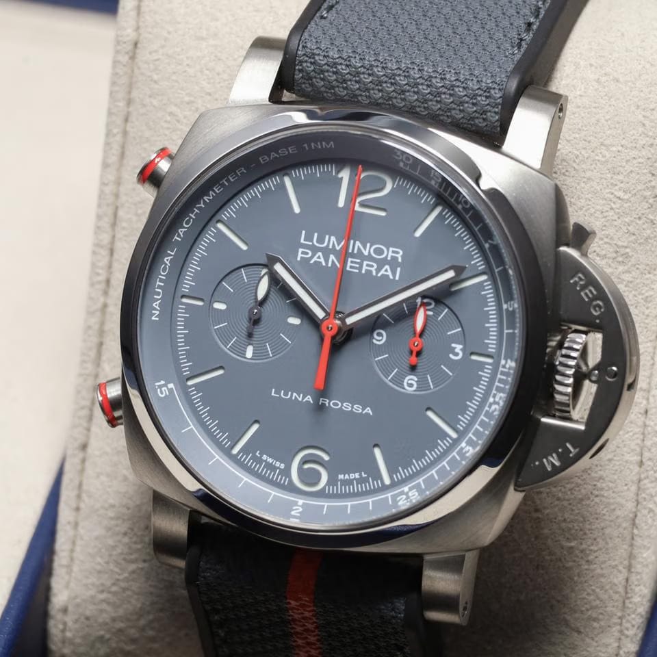 Panerai2025 Complete 44mm Titanium Grey Dial Blue/Red Accents Titanium Bezel Textile Strap PAM016