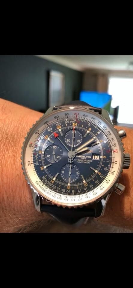 Breitling Navitimer Worldexcellent condition with box & papers.