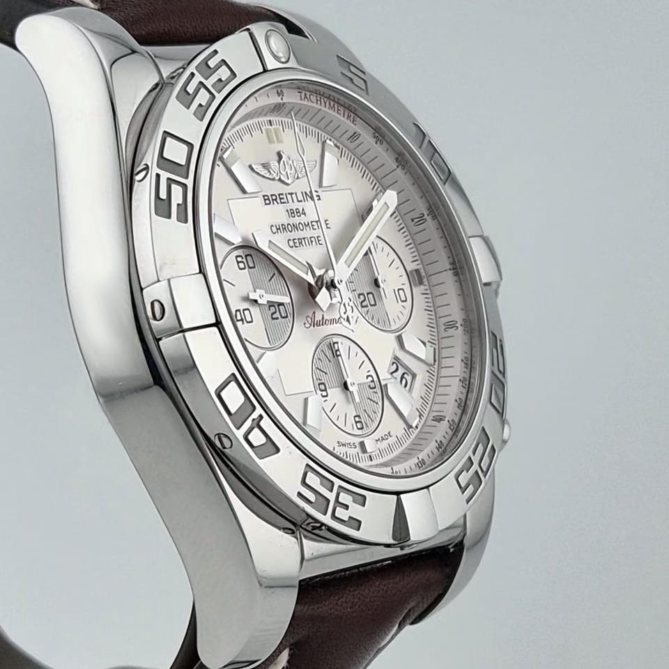 Breitling Chronomat 44orologio uomo / quadrante argentato sierra / cassa acciaio / cinturino pelle marrone - REF. AB011012/G684/437 X