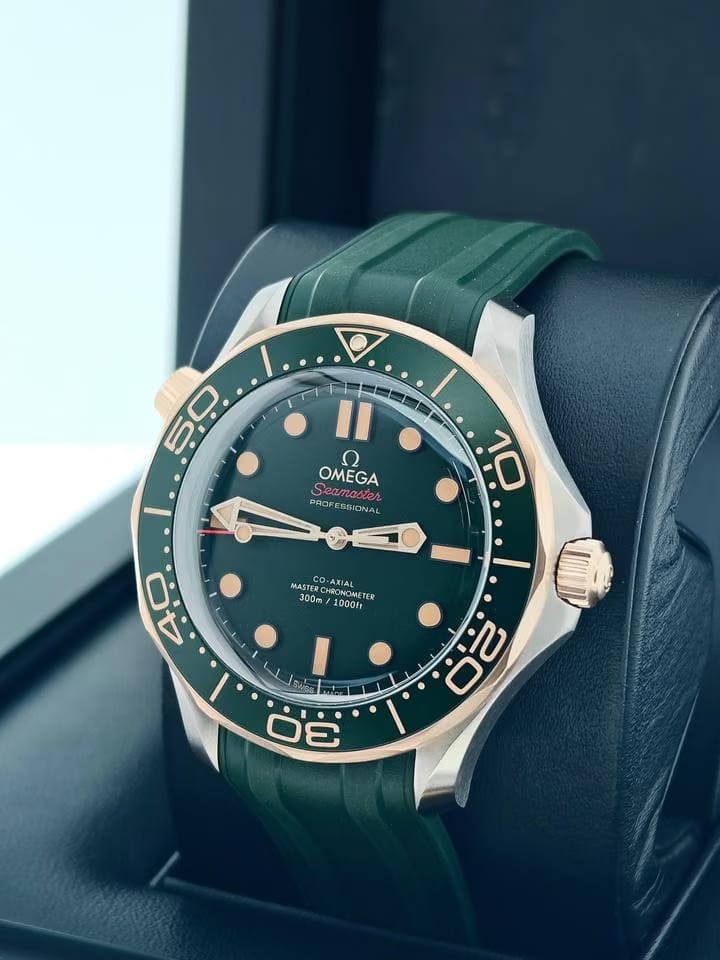 Omega Seamaster Diver 300 Mbasel one Titanium Bronze Gold On green Rubber strap 5 years international warranty