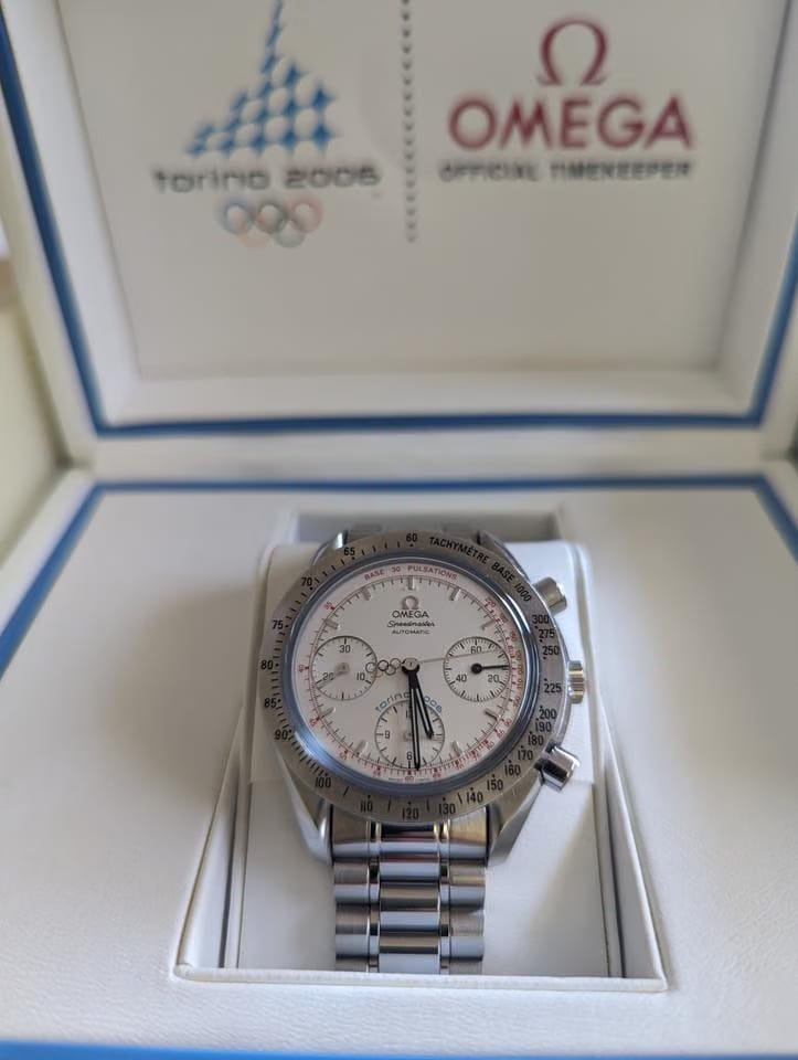 Omega Speedmasterdull set with original receipt. and papers. limited edition