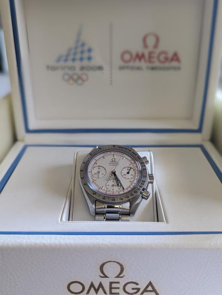 Omega Speedmasterdull set with original receipt. and papers. limited edition