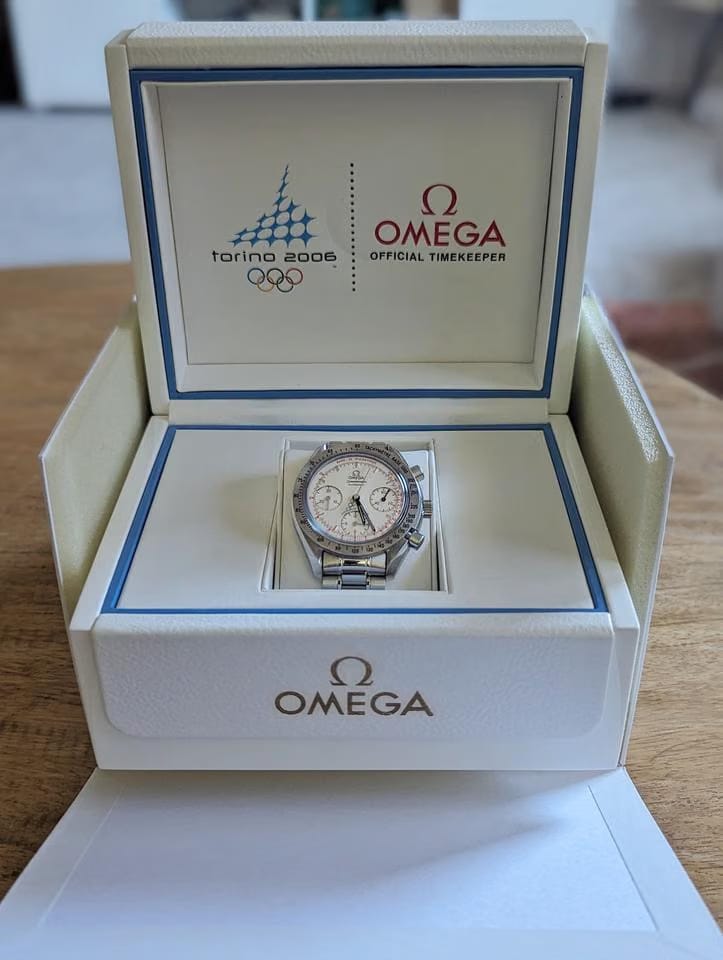 Omega Speedmasterdull set with original receipt. and papers. limited edition