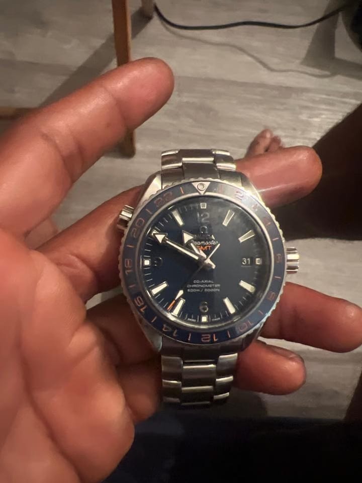 Omega Seamaster Planet Ocean Gmt Gmt seamaster with blie face and orange dial