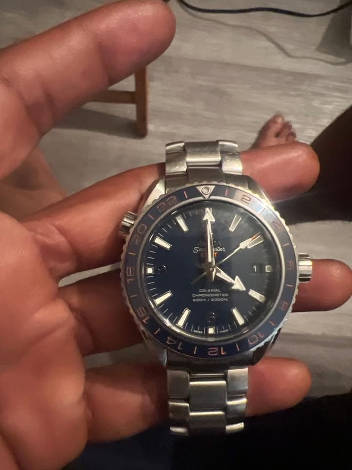 Omega Seamaster Planet Ocean Gmt Gmt seamaster with blie face and orange dial